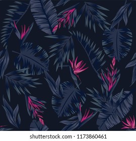 Tropical plants leaves and flowers of the bird of paradise. Seamless beach pattern on black background wallpaper