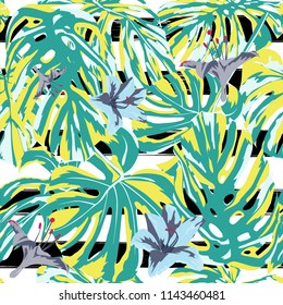 Tropical Print. Jungle Seamless Pattern. Vector Illustration of Tropical Leaves and Flowers. Background Texture, Wrapping Paper, Textile, Fabric or Wallpaper. 
