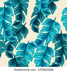 Tropical seamless pattern with banana leaves. Tropical leaves. Turquoise tropical leaves.