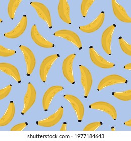 Tropical seamless pattern with bananas on blue background. Hand drawn vector illustration. Summer endless texture for wrapping, textile, fabric design.
