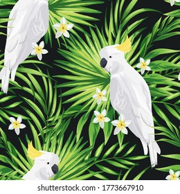 Tropical seamless pattern with bird and exotic flowers. Summer background with hibiscus flowers and palm leaves.
