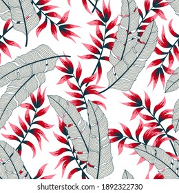 Tropical seamless pattern with bright exotic plants and leaves on a white background. Vector design. Jungle print. Floral background.  Summer colorful hawaiian.