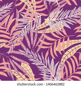 Tropical seamless pattern with bright leaves on a bright purple background. Vector design. Jungle print. Printing and textiles.