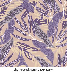 Tropical seamless pattern with bright leaves on beige background. Vector design. Jungle print. Printing and textiles.