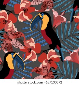 Tropical seamless pattern with colorful toucan,flower and leaf.Summer exotic background.Textile texture