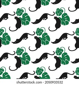 Tropical seamless pattern with drawings monstera, and panthers. Retro style texture with silhouettes of plants and animals.  Trendy background for textile or web. Vector illustration on a white.