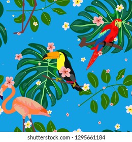 Tropical seamless pattern with exotic birds. Background with flamingo, parrot, toucan and with tropical leaves.