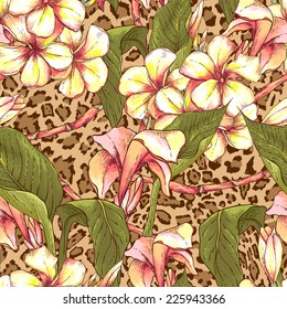 Tropical seamless pattern with exotic flowers on leopard print background. Bird of Paradise