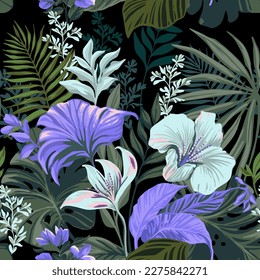 Tropical seamless pattern. Exotic flowers on a black background.
