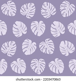 Tropical seamless pattern with exotic monstera leaves on violet background.