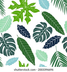 Tropical seamless pattern with exotic palm leaves. Vector illustration.