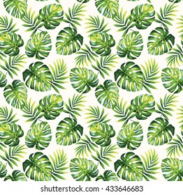 Tropical seamless pattern with exotic palm leaves. Vector illustration.