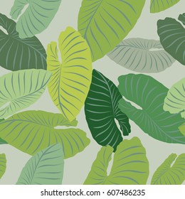 Tropical seamless pattern with exotic palm leaves. Hawaiian style.  Vector illustration.