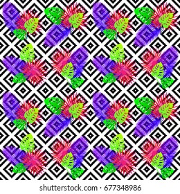 Tropical seamless pattern with exotic vivid leaves on black and white tribal rhombus background. Exotic textile botanical design. Summer jungle design. 90th style. Vector illustration.