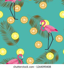 Tropical seamless pattern with flamingos, flower and citrus. Summer background with lemon, lime and flamingos. Birds of the tropics.