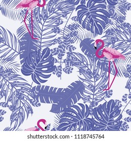 Tropical seamless pattern with flamingos and tropical leaves. Leaves of palm, monstera and banana. Summer background with flamingos.