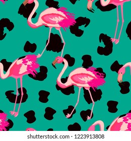 Tropical seamless pattern with flamingos and leopard pattern. Summer background with flamingos. Leopard pattern.