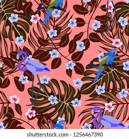 Tropical seamless pattern with flamingos and a parrot. Tropical birds. Summer floral background with tropical plants for covers, wallpaper, paper.
