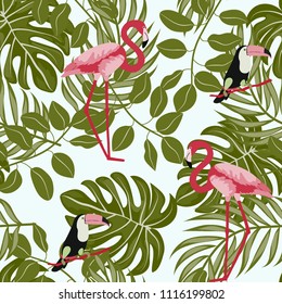 Tropical seamless pattern with flamingos and a toucan. Tropical birds. Summer floral background with tropical plants for covers, wallpaper, paper.