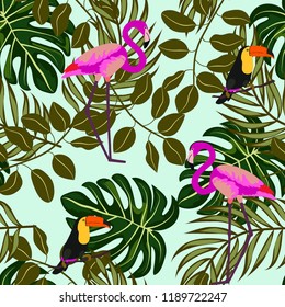 Tropical seamless pattern with flamingos and a toucan. Tropical birds. Summer floral background with tropical plants for covers, wallpaper, paper.