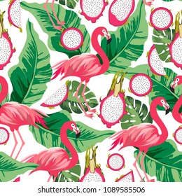 Tropical seamless pattern with flamingos,leafs and dragon fruits.Colorful summer vector background.Textile texture