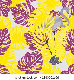 Tropical seamless pattern with flamingos.Summer background with flamingos.
