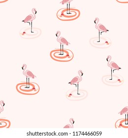 Tropical seamless pattern with flamingos.Summer background with flamingos.