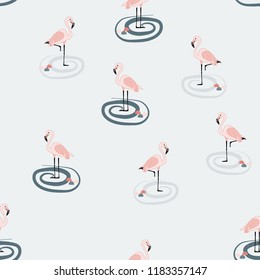 Tropical seamless pattern with flamingos.Summer background with flamingos.