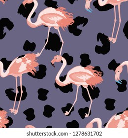 Tropical seamless pattern with flamingos.Summer background with bird. Exotic seamless pattern with pink flamingo.
