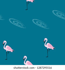 Tropical seamless pattern with flamingos.Summer background with flamingos.