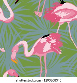 Tropical seamless pattern with flamingos.Summer background with bird. Exotic seamless pattern with pink flamingo.