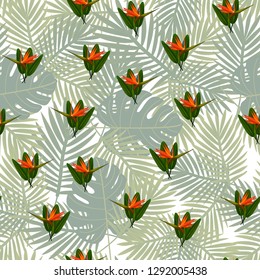 Tropical seamless pattern of flowers bird of Paradise (strelitzia) on the background of palm leaves. Exotic illustration of jungle plants.