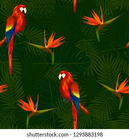 Tropical seamless pattern of flowers bird of Paradise (strelitzia) and parrots on background of palm leaves. Exotic illustration of wildlife.