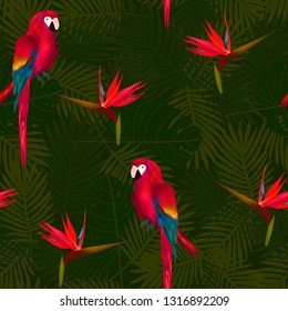 Tropical seamless pattern of flowers bird of Paradise (strelitzia) and parrots on background of palm leaves. Exotic illustration of wildlife.