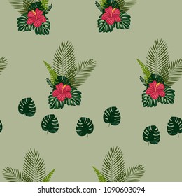 Tropical seamless pattern with flowers and leaves in a green color.