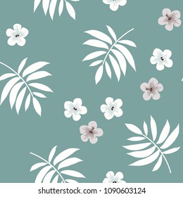 Tropical seamless pattern with flowers and leaves in a green color.