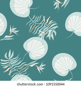 Tropical seamless pattern with flowers and leaves on a blue background. Jungle.Tropical forest. Background with tropical plants.