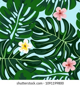 Tropical seamless pattern with green leaves and flowers. Monstera and hibiscus.