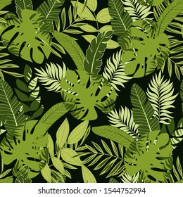 Tropical seamless pattern with green leaves on dark background. Floral seamless vector tropical pattern background with exotic leaves, jungle leaf. Trendy summer Hawaii print.