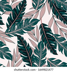 Tropical seamless pattern with green and pink plants on a white background. Creative abstract background. Trendy summer Hawaii print.  Floral pattern. Exotic wallpaper, Jungle leaves.