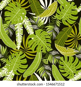 Tropical seamless pattern with green plants and leaves on a dark background. Vector background for various surface. Exotic wallpaper, Hawaiian style. Jungle leaves.