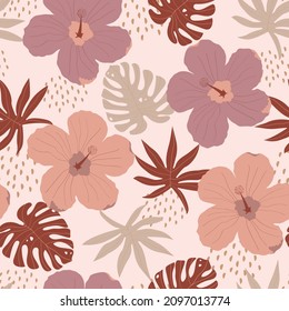 Tropical seamless pattern with hibiscus flowers and palm leaves. Exotic Hawaiian background. Vector illustration of a floral jungle. Abstract botanical drawing.