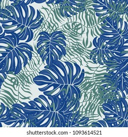 Tropical seamless pattern with leaves. Beautiful tropical isolated leaves. Fashionable summer background with leaves for fabric, wallpaper, paper, covers.
