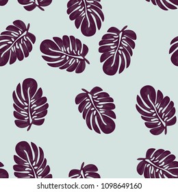 Tropical seamless pattern with leaves. Beautiful tropical isolated leaves. Fashionable summer background with leaves for fabric, wallpaper, paper, covers.