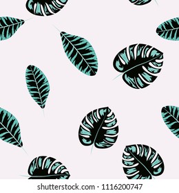 Tropical seamless pattern with leaves. Beautiful tropical isolated leaves. Fashionable summer background with leaves for fabric, wallpaper, paper, covers.