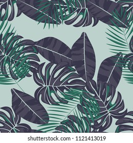 Tropical seamless pattern with leaves. Beautiful tropical isolated leaves. Fashionable summer background with leaves for fabric, wallpaper, paper, covers.