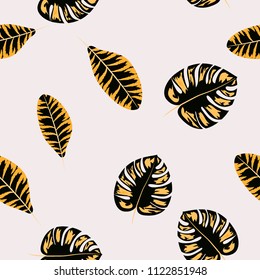 Tropical seamless pattern with leaves. Beautiful tropical isolated leaves. Fashionable summer background with leaves for fabric, wallpaper, paper, covers.