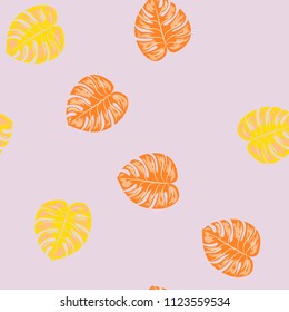 Tropical seamless pattern with leaves. Beautiful tropical isolated leaves. Fashionable summer background with leaves for fabric, wallpaper, paper, covers.