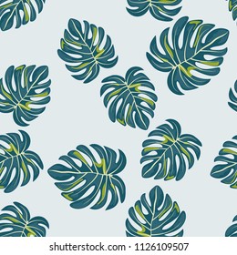 Tropical seamless pattern with leaves. Beautiful tropical isolated leaves. Fashionable summer background with leaves for fabric, wallpaper, paper, covers.