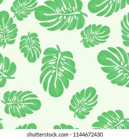 Tropical seamless pattern with leaves. Beautiful tropical isolated leaves. Fashionable summer background with leaves for fabric, wallpaper, paper, covers.